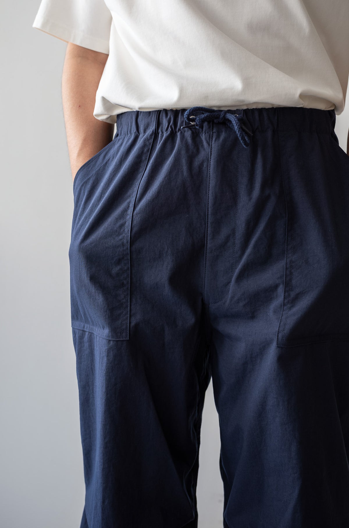 Shrunken Nylon Baker Pants〈NAVY〉