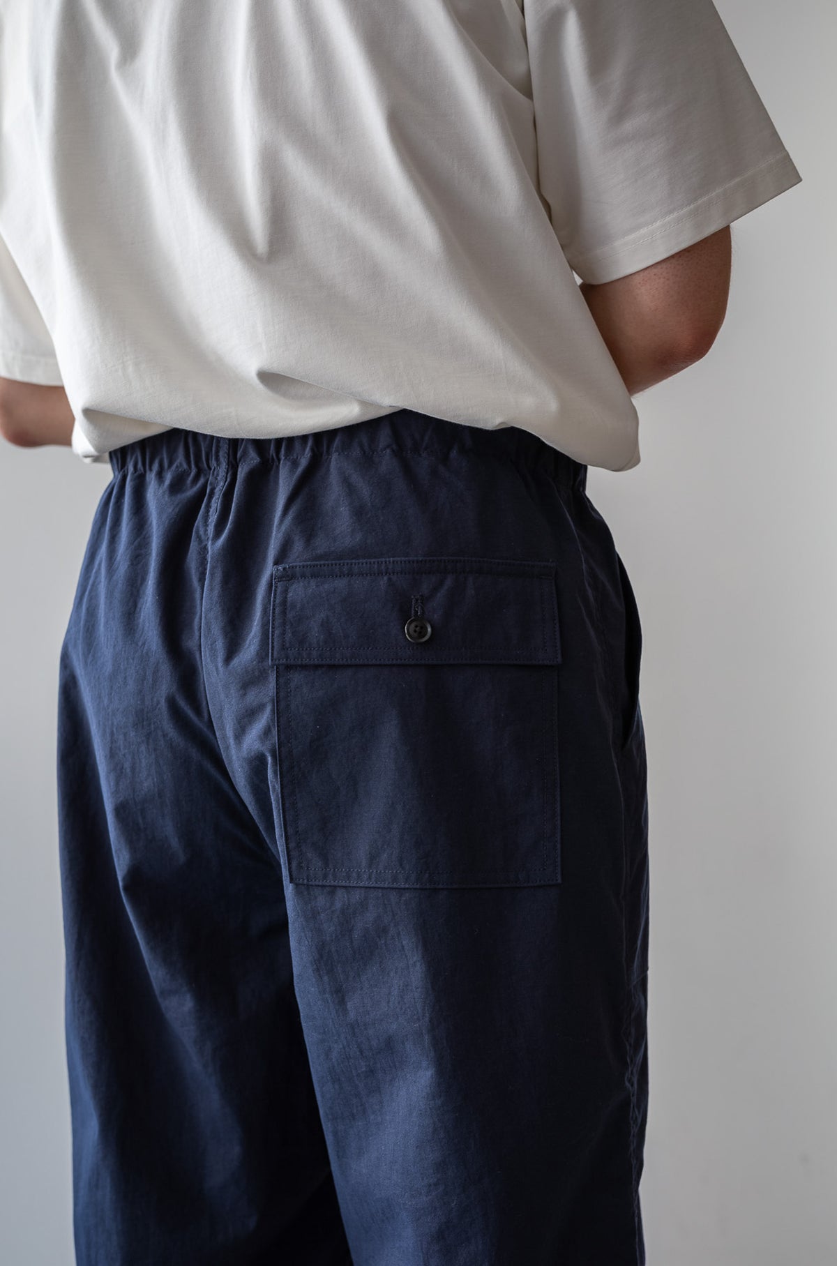 Shrunken Nylon Baker Pants〈NAVY〉