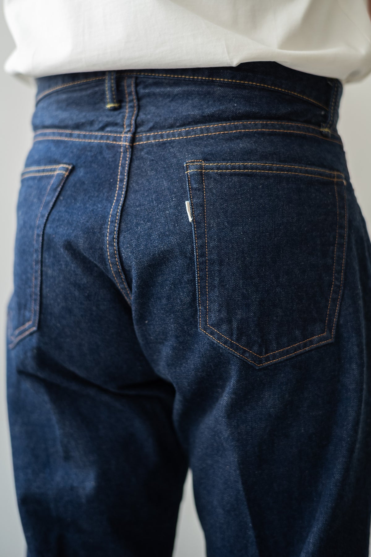 Denim Tapered Trousers 〈INDIGO〉